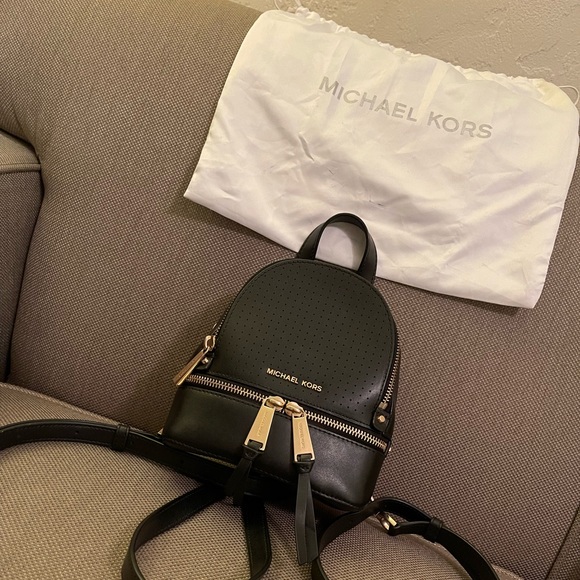 It’s a mini Michael Kors, backpack - Picture 1 of 2